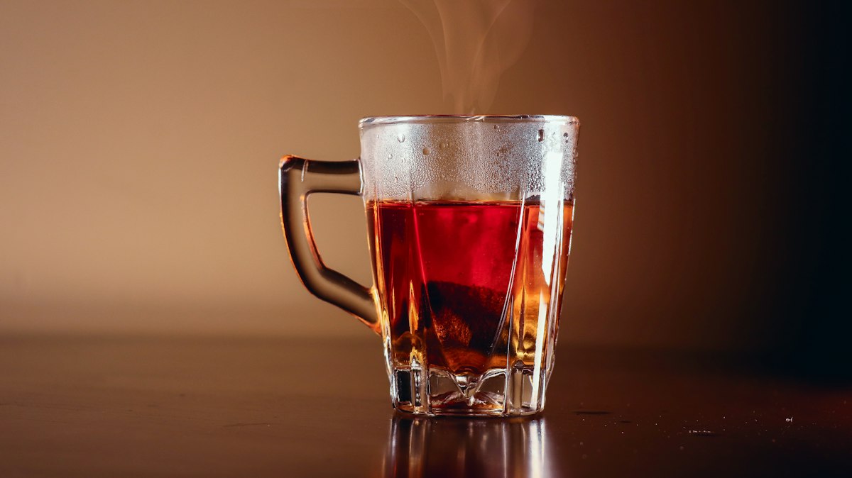 Steaming cup of herbal tea